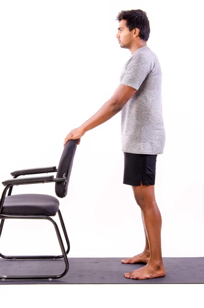 Mini Squat holding a Chair