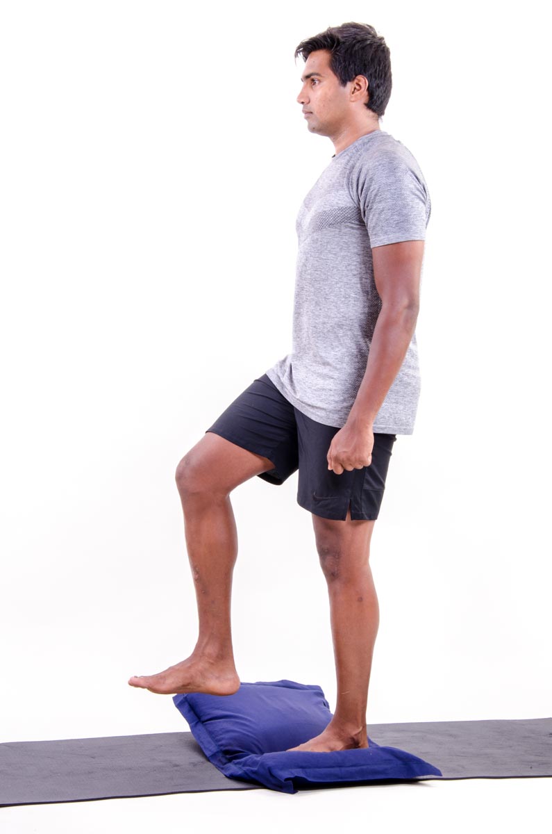 Single Leg Stand on 1 Pillow Reaching with Other Leg Vissco