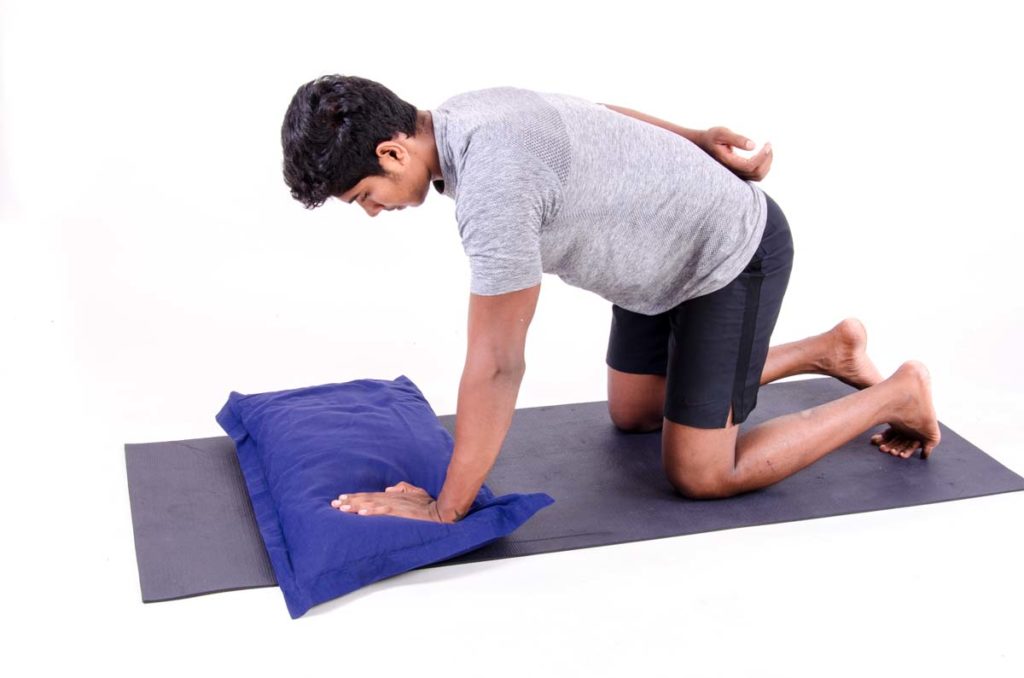 Q-ped Scapular Push with One Hand on Pillow