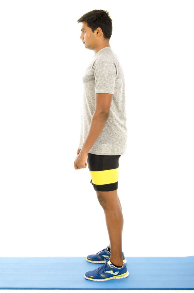 Squat with Theraband