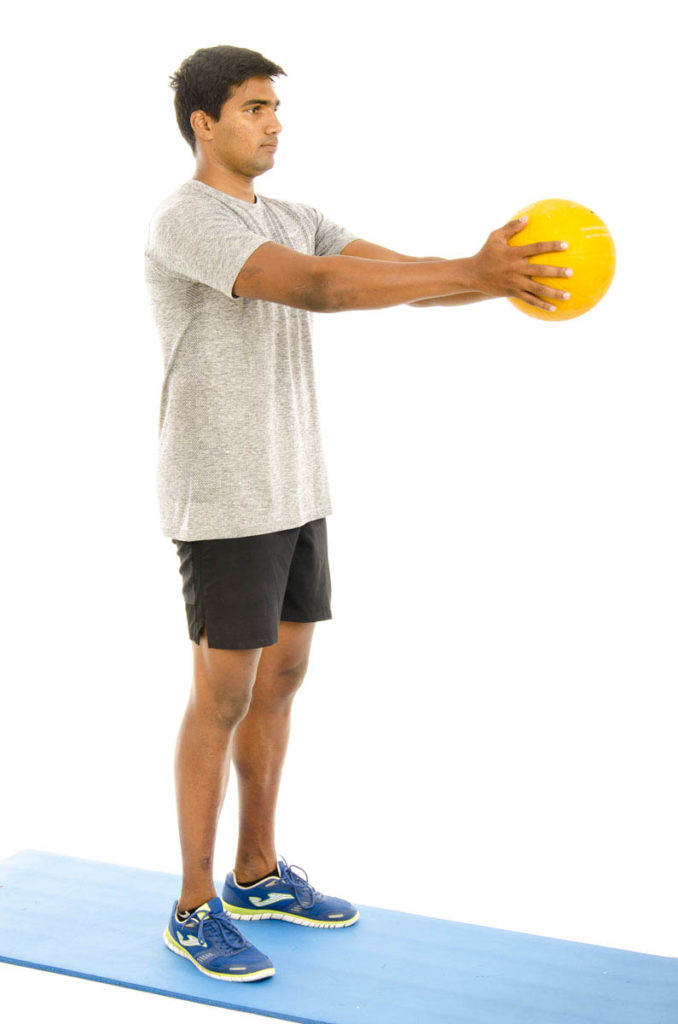 Single Leg Stand with Trunk Twist holding Ball